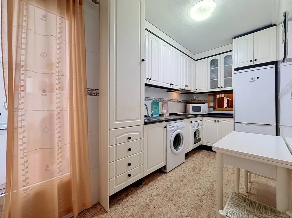 Prime Central Torrevieja Living | Expansive 3-Bedroom Residence with Private Balcony & Elevator
