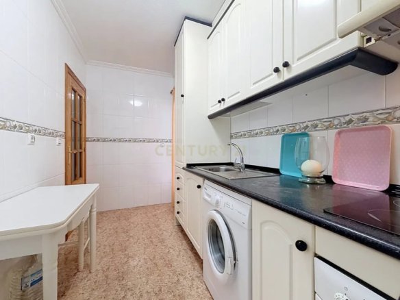 Prime Central Torrevieja Living | Expansive 3-Bedroom Residence with Private Balcony & Elevator