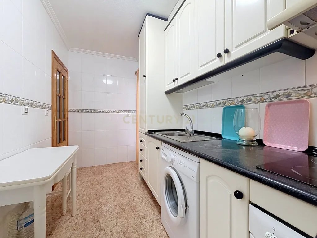 Prime Central Torrevieja Living | Expansive 3-Bedroom Residence with Private Balcony & Elevator