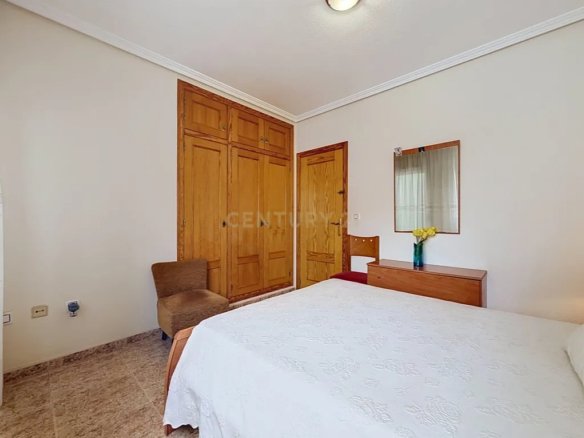 Prime Central Torrevieja Living | Expansive 3-Bedroom Residence with Private Balcony & Elevator