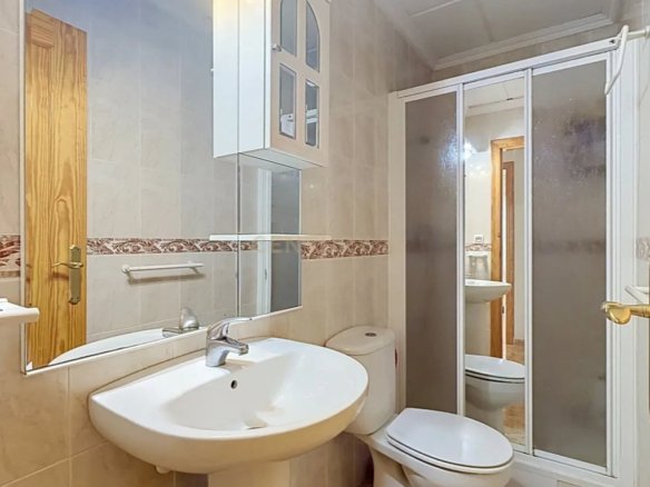 Prime Central Torrevieja Living | Expansive 3-Bedroom Residence with Private Balcony & Elevator