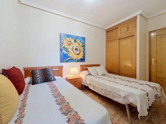 Prime Central Torrevieja Living | Expansive 3-Bedroom Residence with Private Balcony & Elevator